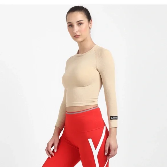 ADIDAS
Women Solid Round Neck Beige T-Shirt - Picture 3 of 9